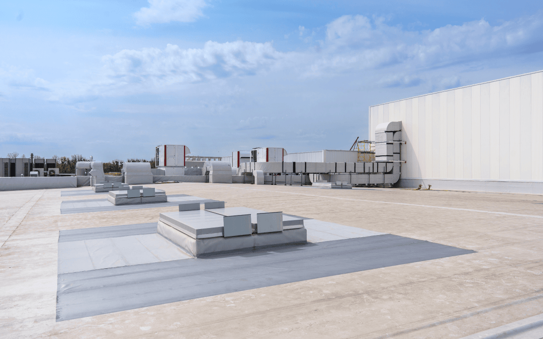 Why Proper Drainage Is the Lifeline of Every Commercial Flat Roof: A Guide From Minnesota Roofers